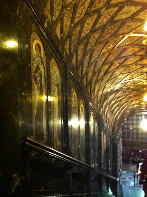 Paintings of  Saints lined the hallway to see La Moreneta.