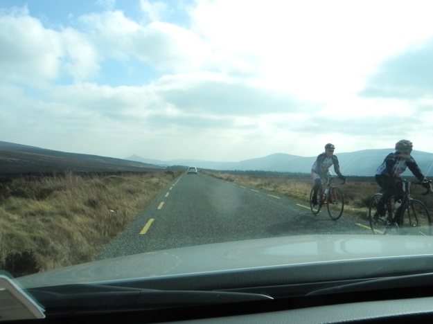 En route to Glendalough- cyclists riding hard