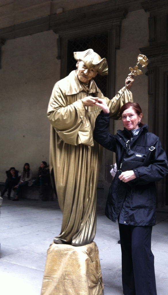 Had to get a photo of Mom with a performer outside the Uffizi Gallery