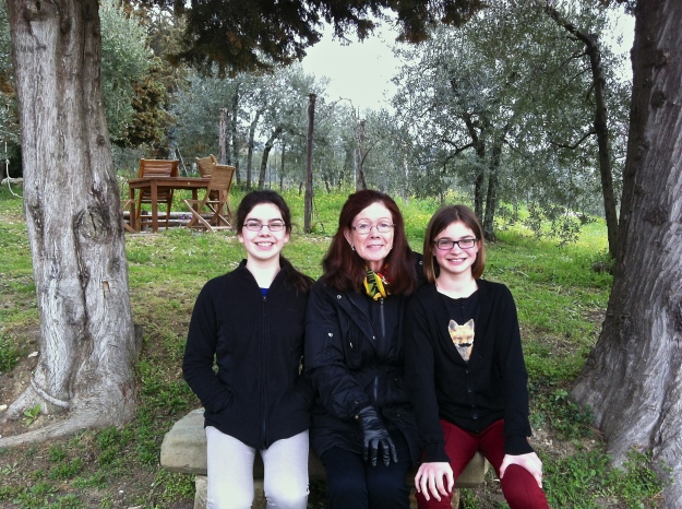 Grace, Mom and Emmie soaking in the view at Ancora del Chianti